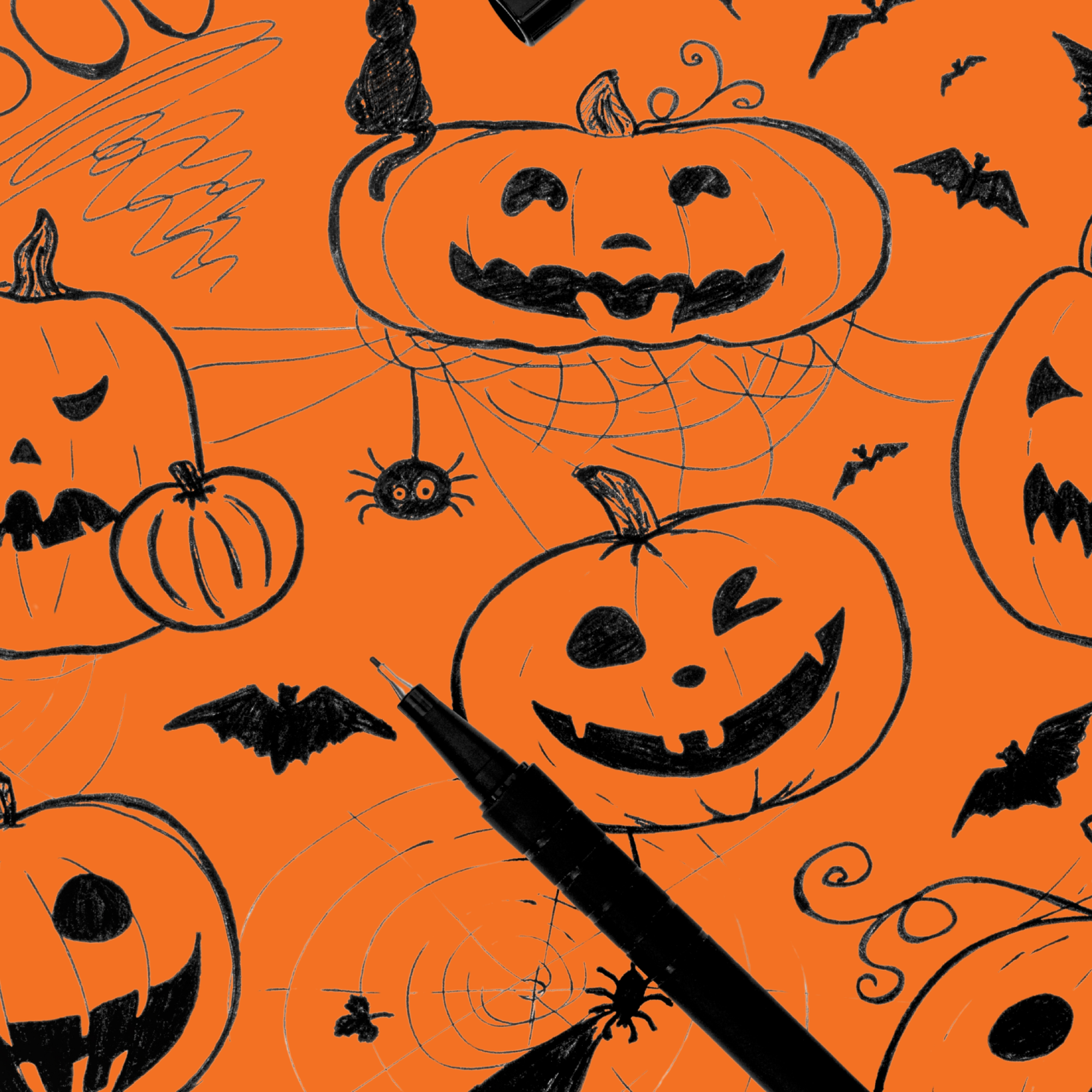 Pumpkin drawing on orange paper. 