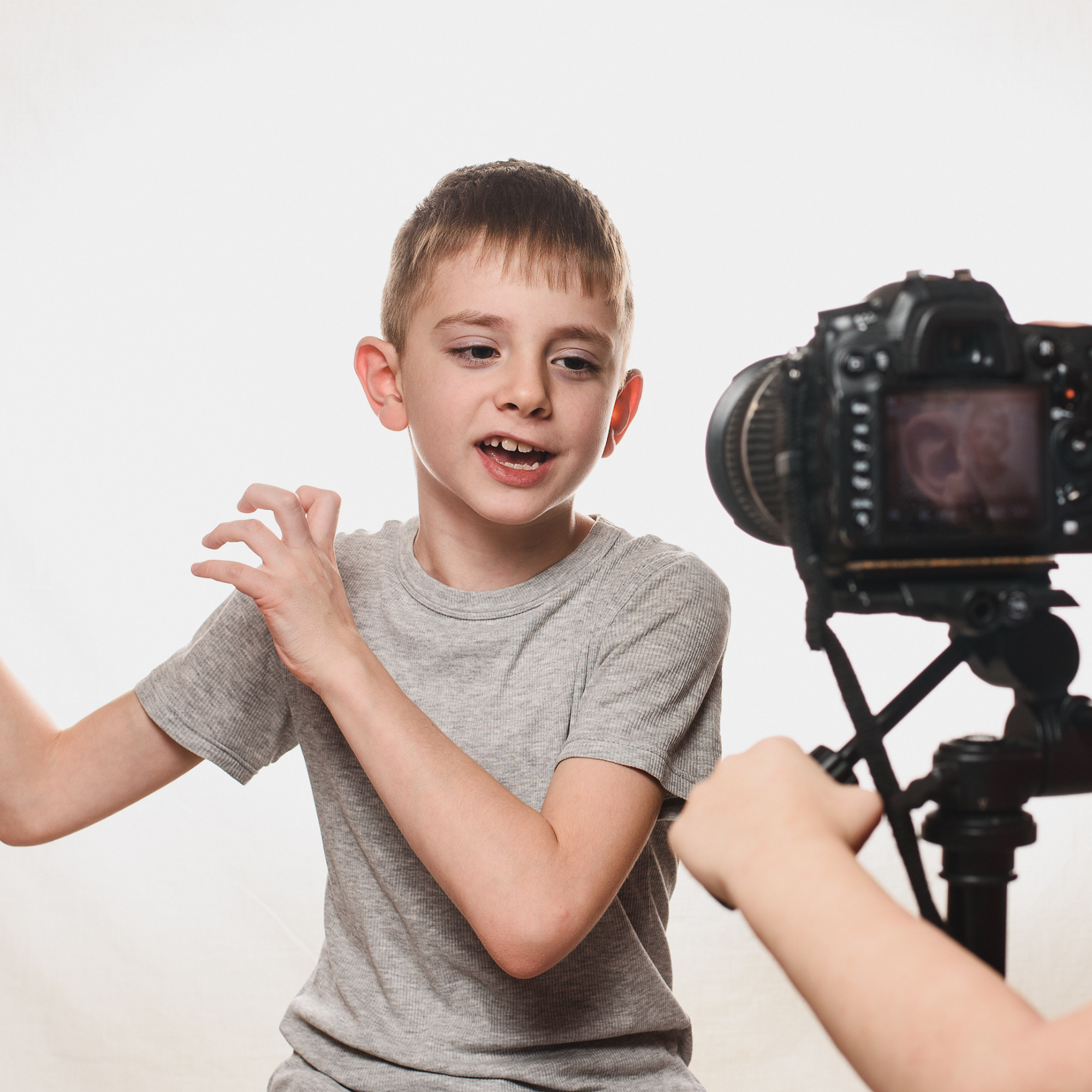 Boy talking in front of camera