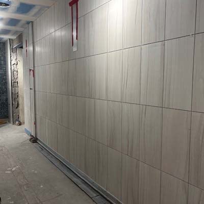 Progress on tile work in the entry area